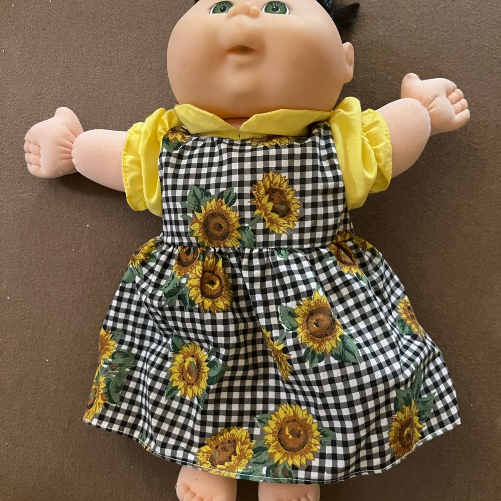 Cabbage Doll with sunflower dress laugh and giggles